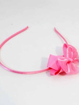 Vinchas con moño fucsia